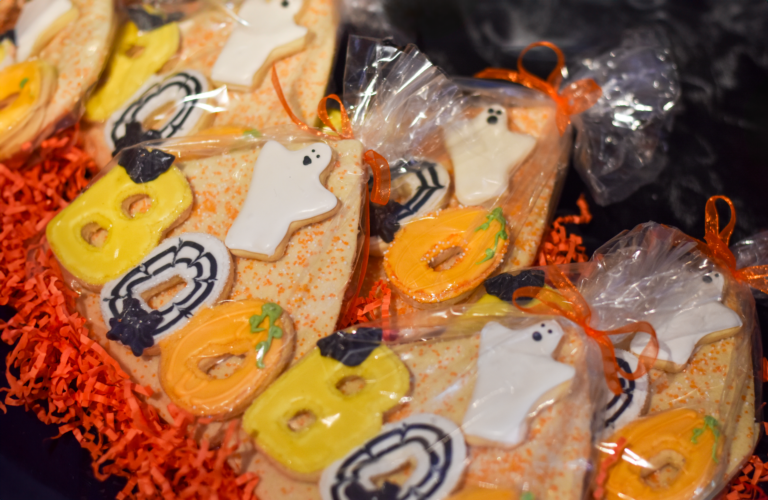 'Boo' ghost cookies lie in rows in bags