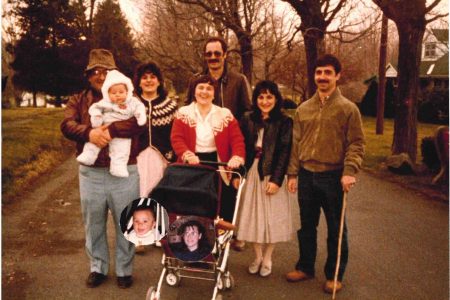 Pirone family walking on the property